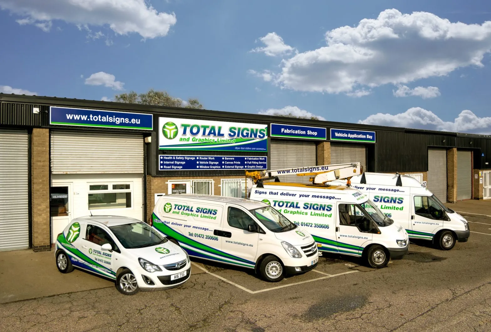 Total Signs and Graphics premises with fleet vehicles